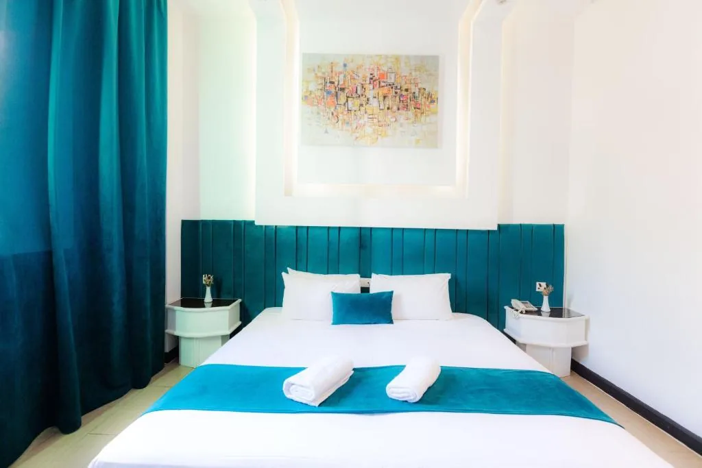 Chambre Double Deluxe — Windsor Hotel City Center